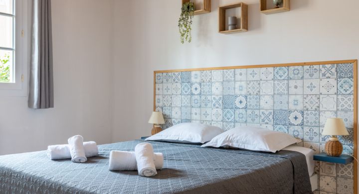 Chambre parents appartement Camping Le Petit Rocher en Vendée